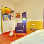 Großes Comfort Zimmer mit Bildern von Udo Lindenberg im Retro-Art Hotel Lünen